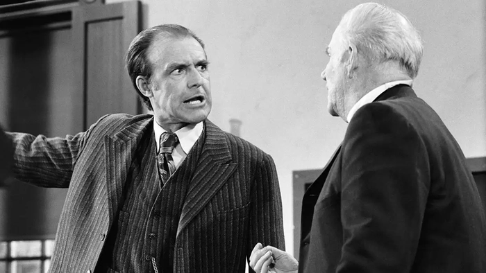 Richard Bull, en el papel de Nels Oleson, y Dabbs Greer, en el de el reverendo Robert Alden, aparecen juntos en una escena.