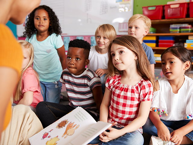children classroom reading teacher book
