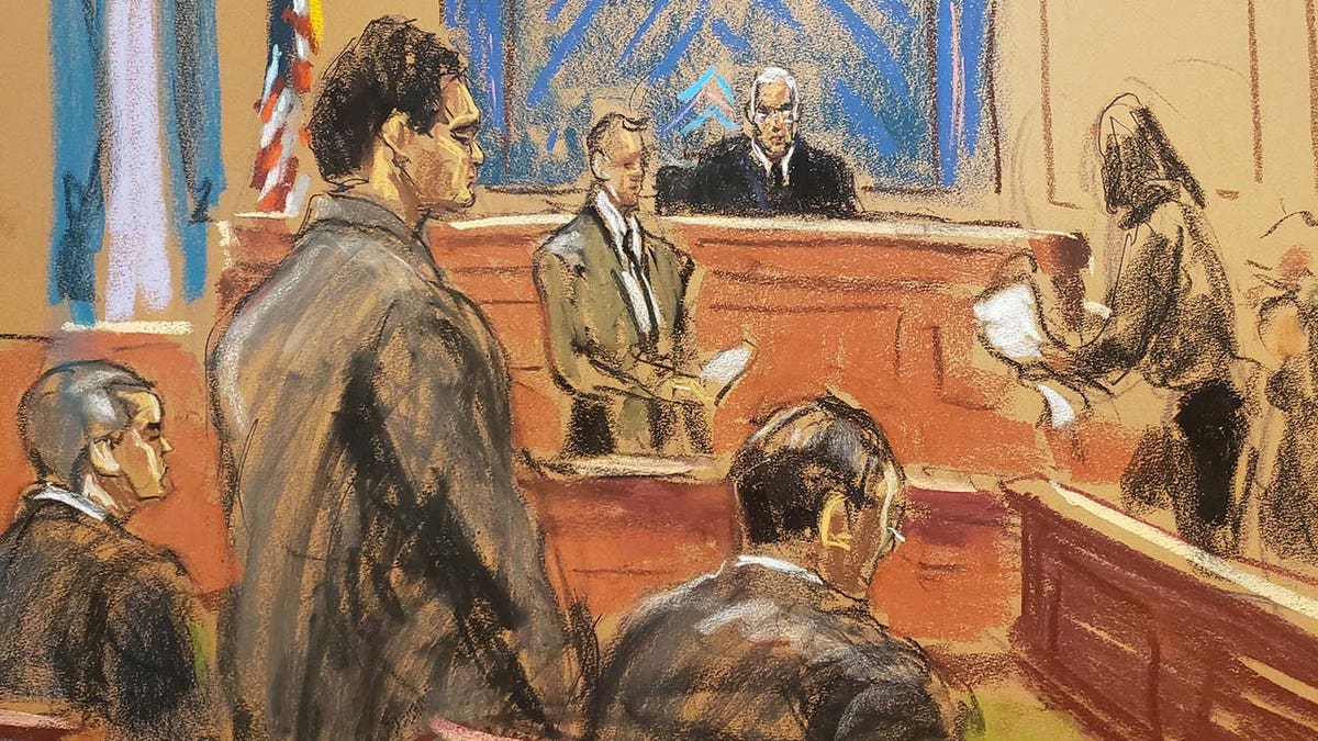 El fundador de FTX, Sam Bankman-Fried, se para mientras el presidente del jurado lee el veredicto en su juicio por fraude