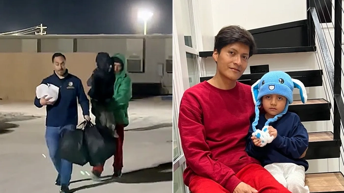 Мужчина несет ребенка во время ночной прогулки на улице