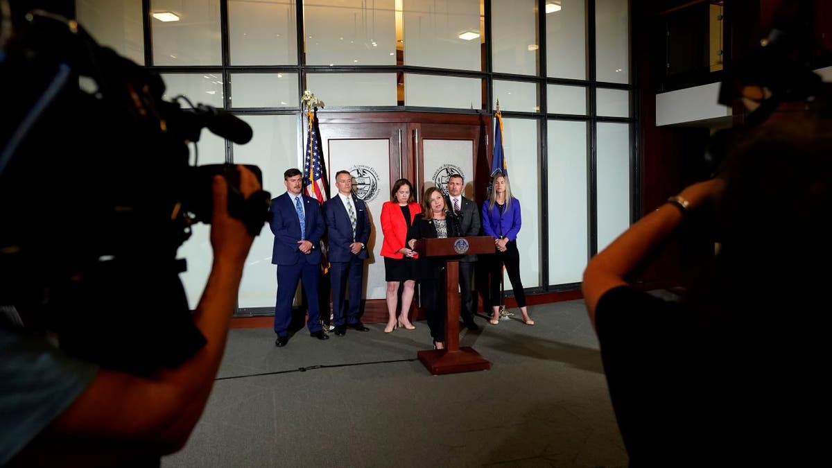Wide shot of press conference