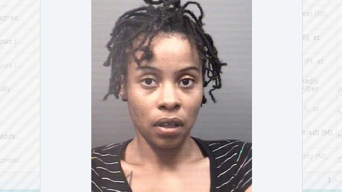 woman charged with assault and child abuse after allegedly jumping out of moving car while holding child