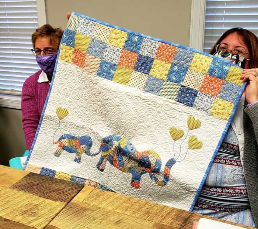 quilts provide a warm hug for victims of abuse