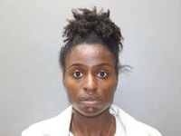 woman charged with failing to report child abuse